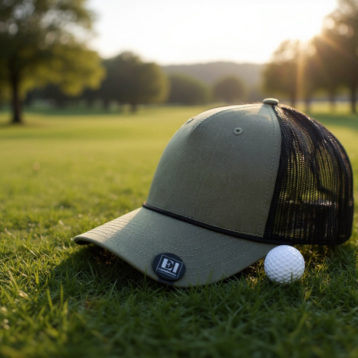 Golf course photo featuring a personalized magnetic hat clip and golf ball. Great for tournaments, promotional giveaways, and business gifts. Each clip is laser engraved, lightweight, durable, and perfectly sized at 24 mm x 27 mm to showcase your logo in style.